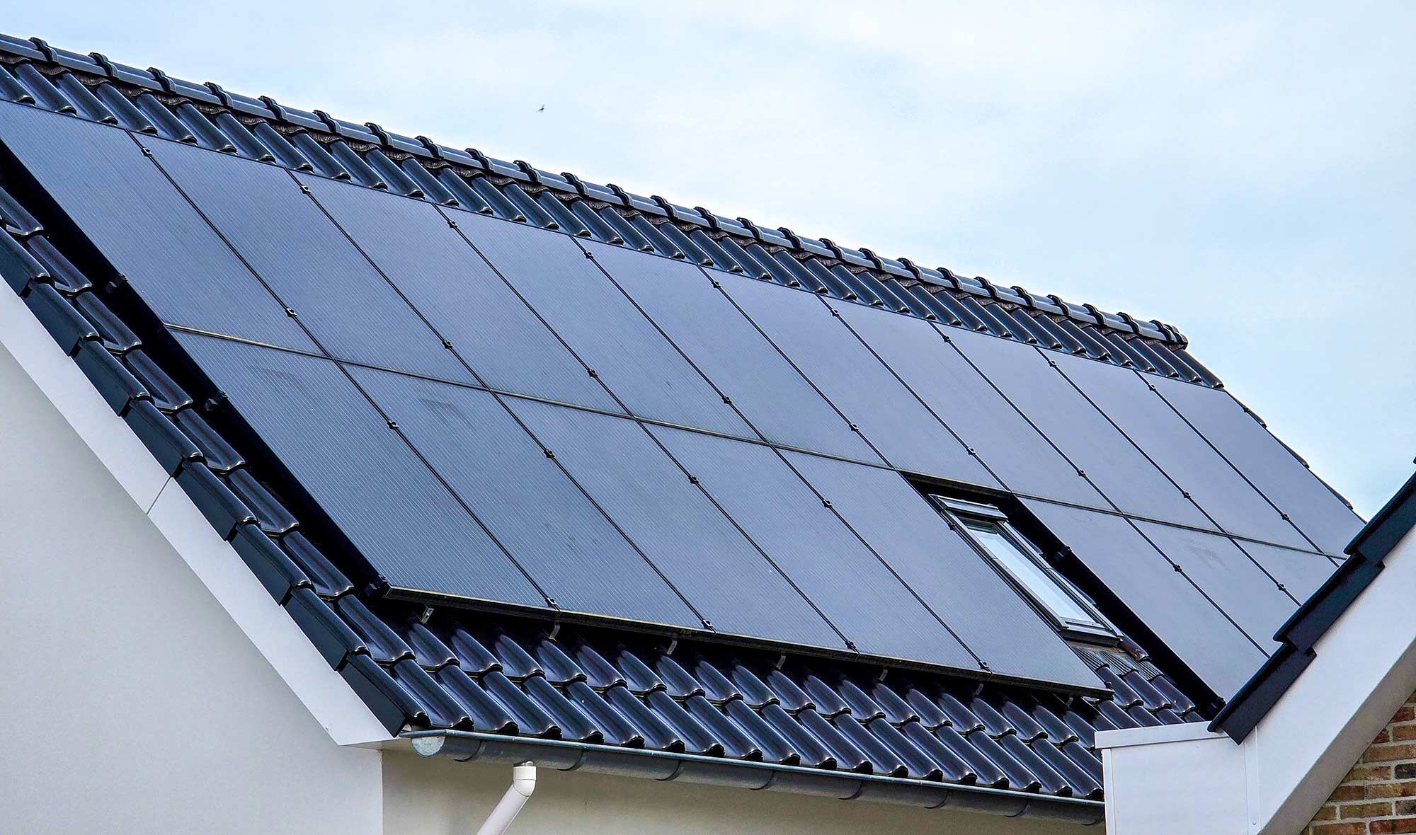 Solar panels on a flat roof with tilted mounting frame